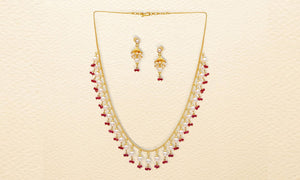 Glam up your outfit with these layered gold necklaces.