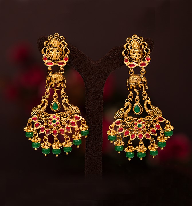 Lakshmi Earrings in kundan and Nakshi workmanship using yellow gold
