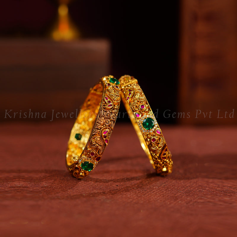 22K Gold Nakshi Bangles with Emerald Accents