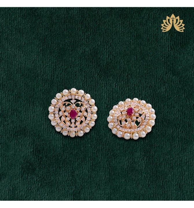Flowers themed Ear studs crafted using yellow gold with Diamonds