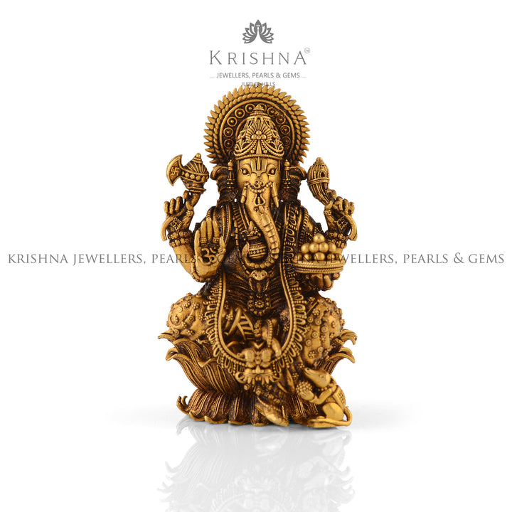 Divine Ganesha Idol In Pure Gold - Krishna Jewellers Pearls and Gems