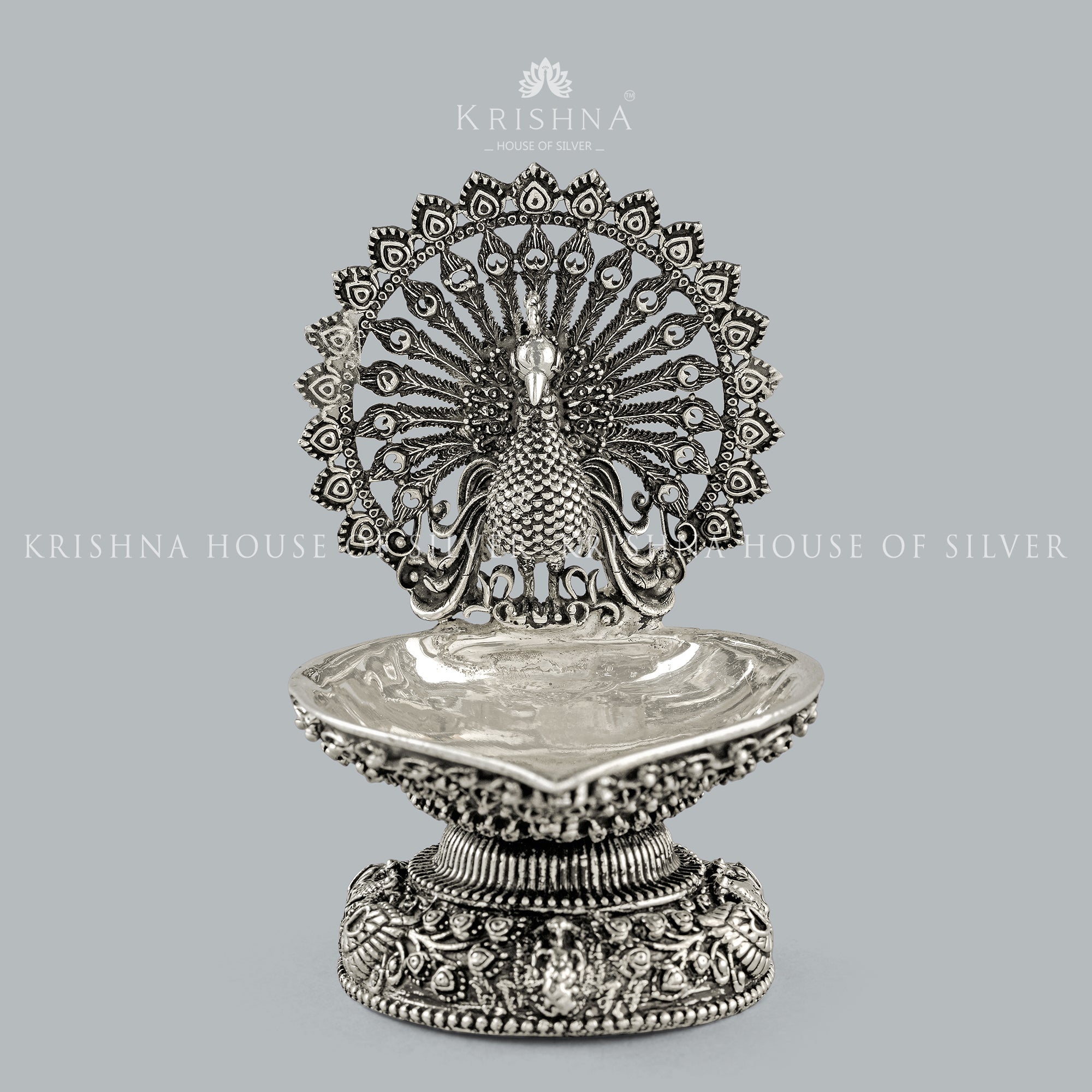 Magnificent Peacock Silver Diya - Krishna Jewellers Pearls and Gems