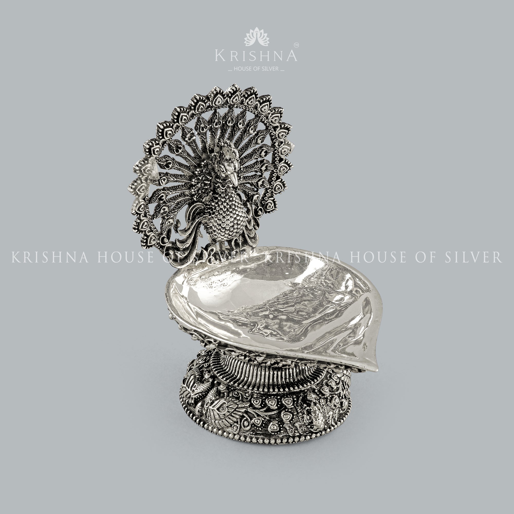 Magnificent Peacock Silver Diya - Krishna Jewellers Pearls and Gems