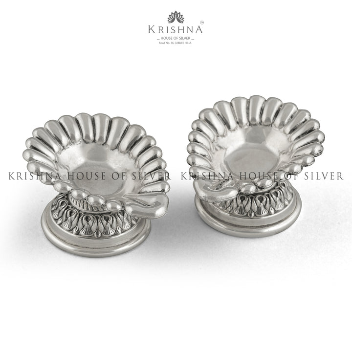 Blessings-Infused Silver Deppam Pair - Krishna Jewellers Pearls and Gems