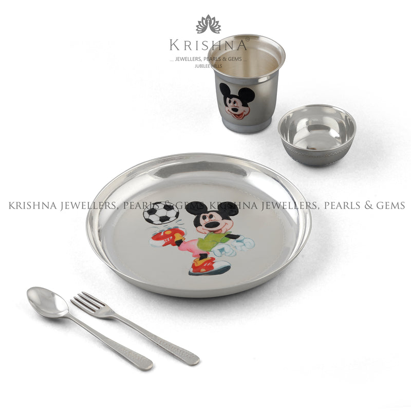 Pure silver baby thali set with alphabet-engraved plate, glass, bowl and spoon in cartoon design by Krishna Jewellers