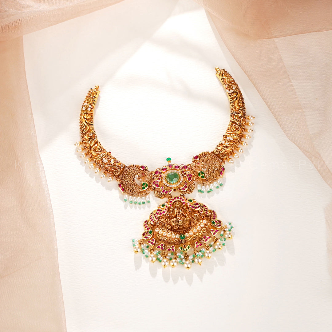 Antique Gold Peacock Necklace with Lakshmi Pendant and Emerald Centre