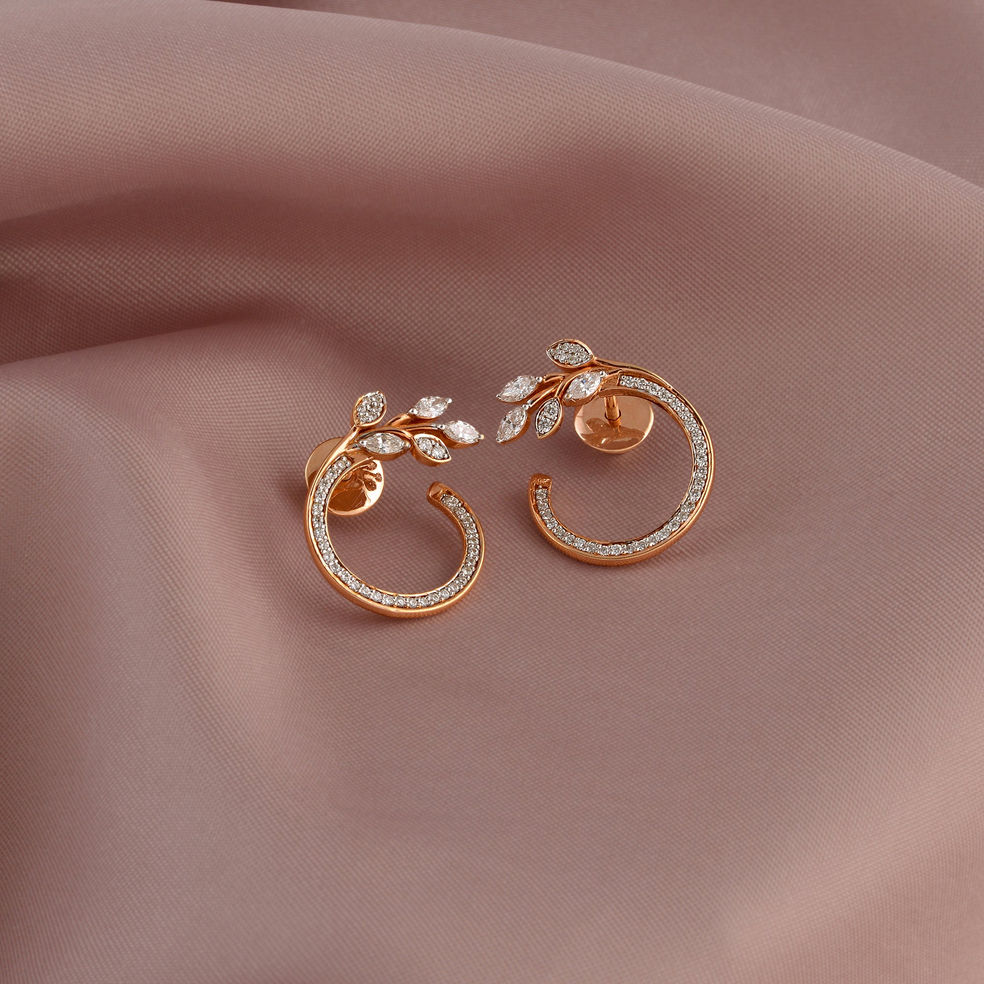 Diamond stud Earrings in Leaf Motif - Krishna Jewellers Pearls and Gems