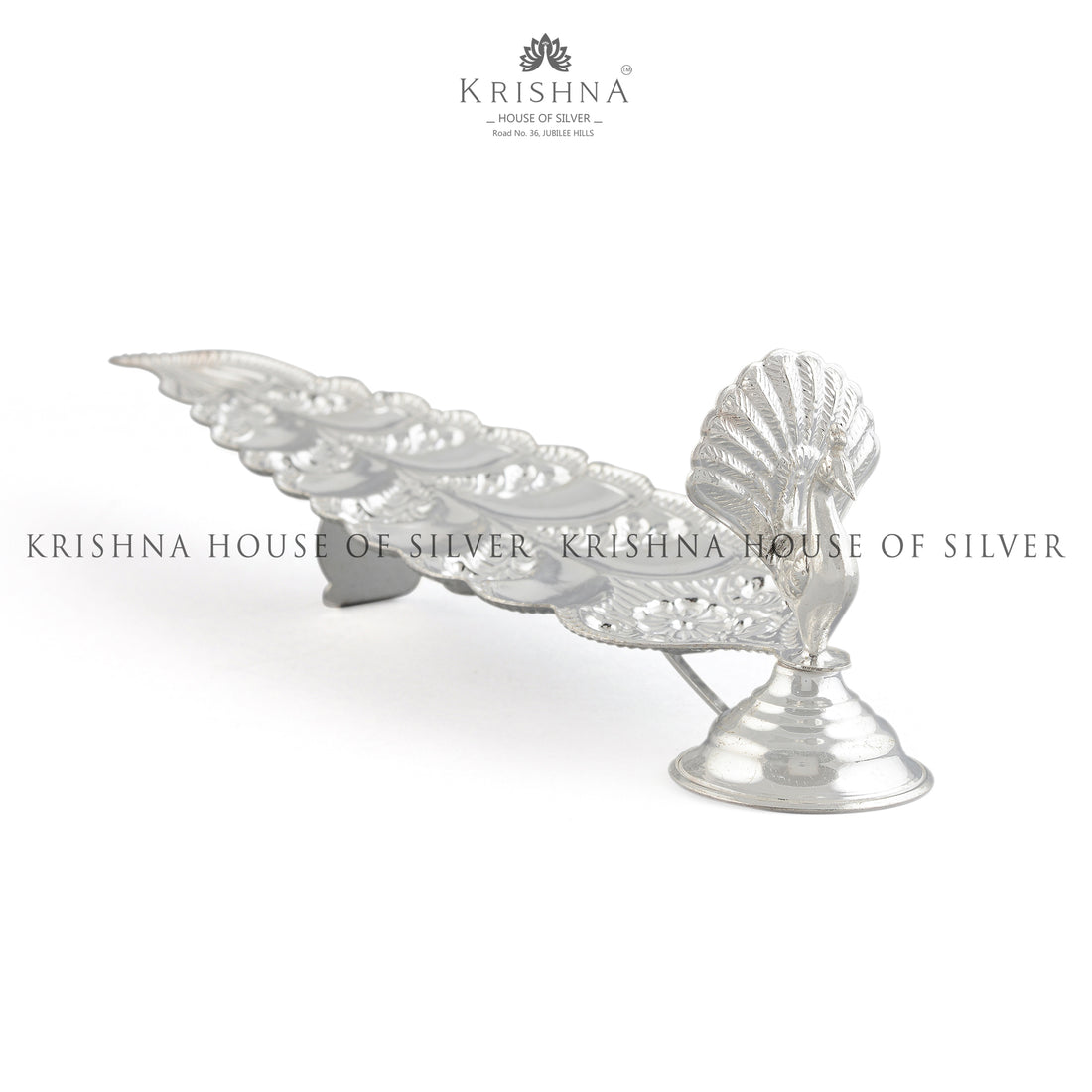 Sacred  Elongated Silver Agarbatti  in Peacock Design - Krishna Jewellers Pearls and Gems