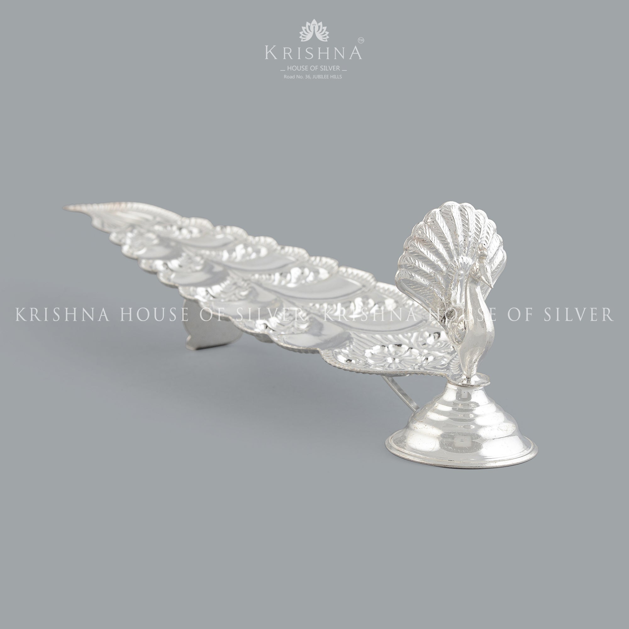 Sacred  Elongated Silver Agarbatti  in Peacock Design - Krishna Jewellers Pearls and Gems