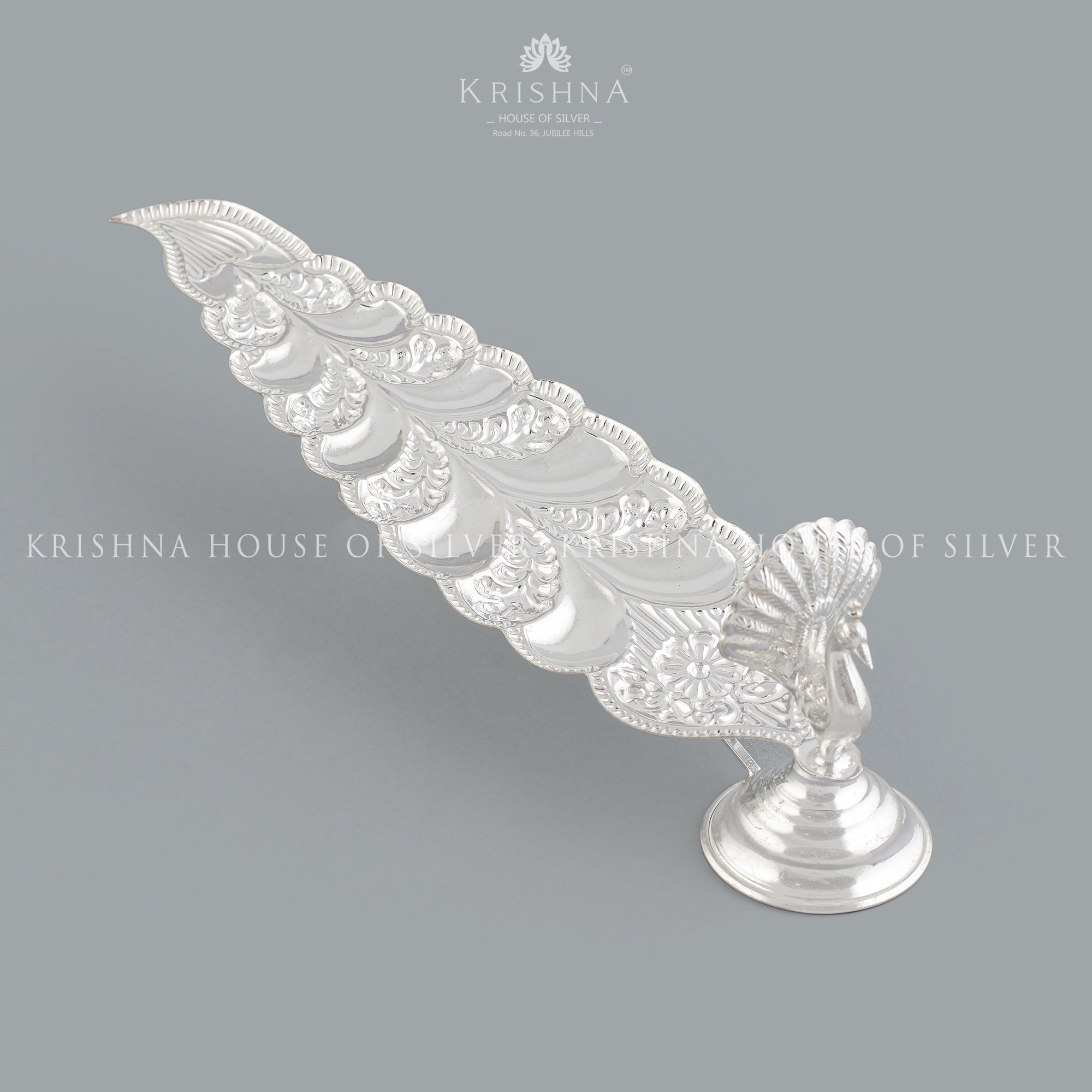 Sacred  Elongated Silver Agarbatti  in Peacock Design - Krishna Jewellers Pearls and Gems