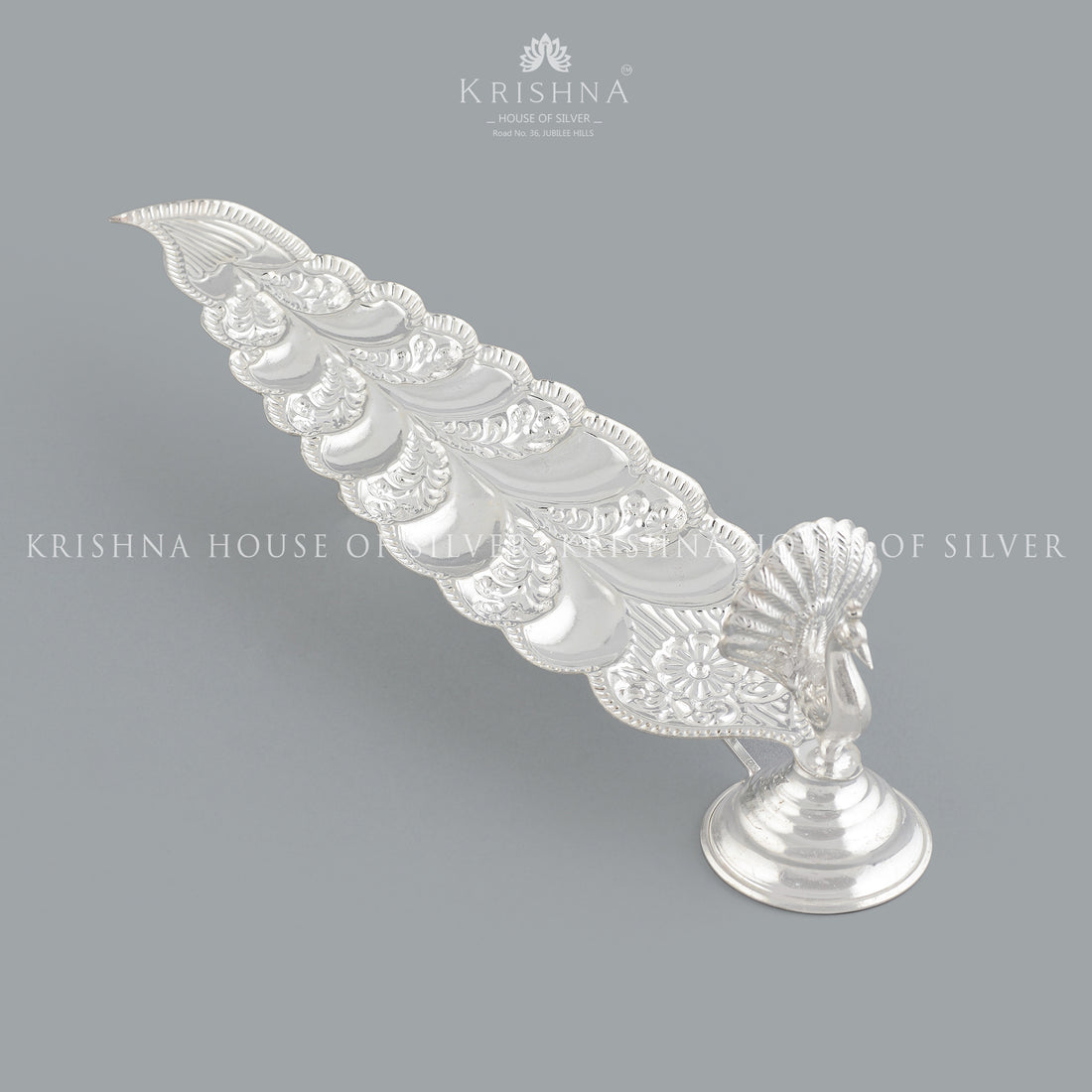 Sacred  Elongated Silver Agarbatti  in Peacock Design - Krishna Jewellers Pearls and Gems