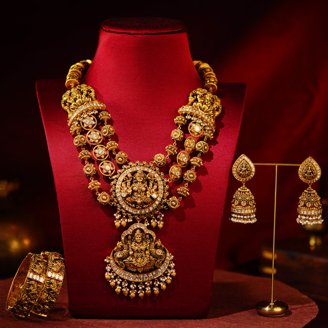 Traditional 22K Gold Bridal Set with Divine Lakshmi Motifs