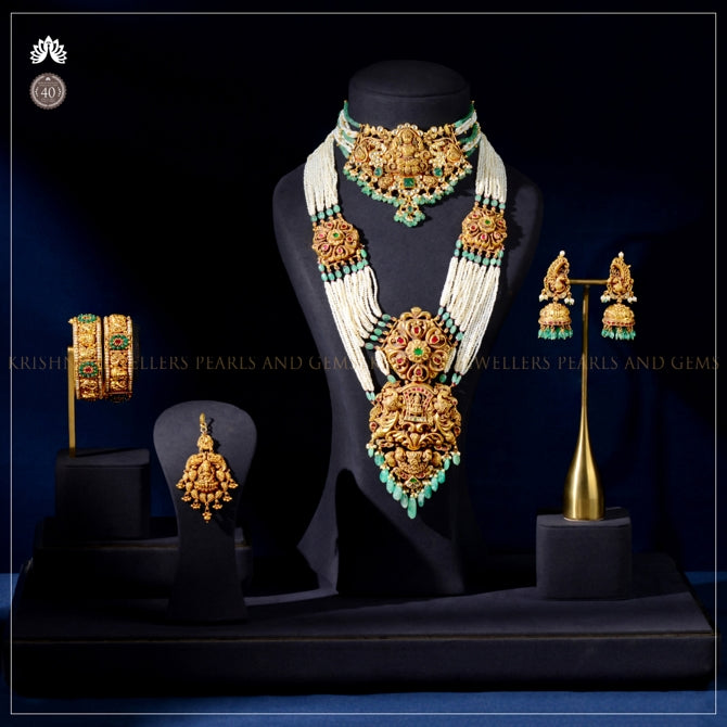 Bridal Gold Pearl Jewellery Set with Temple Carvings & Gemstones
