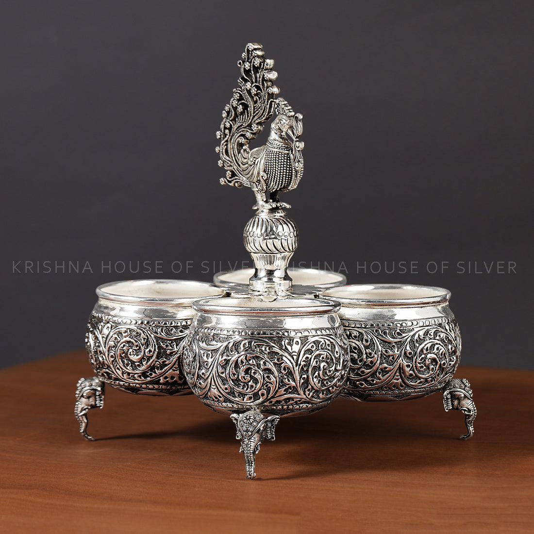 92.5 Silver Panchapali with Elephant Legs and Peacock Handle