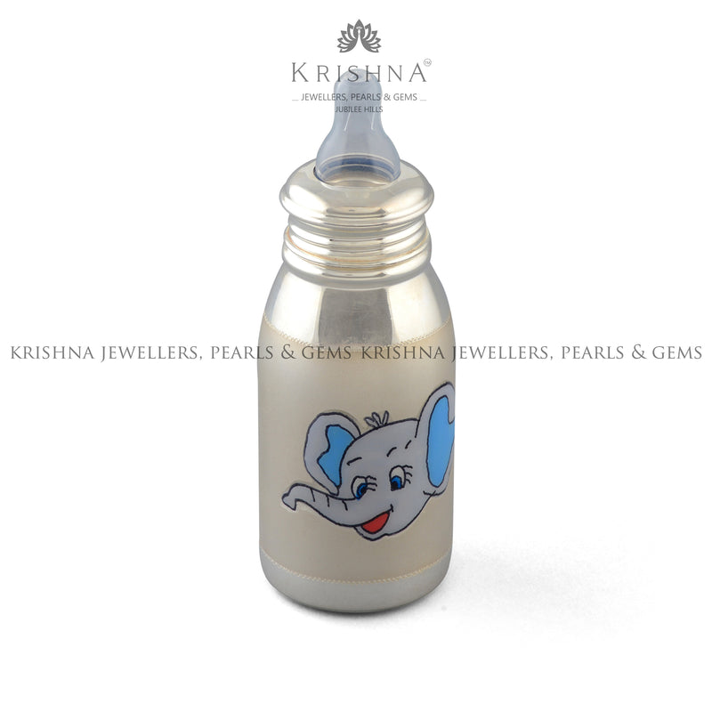 Pure silver feeding bottle for baby with hand-painted elephant motif by Krishna Jewellers