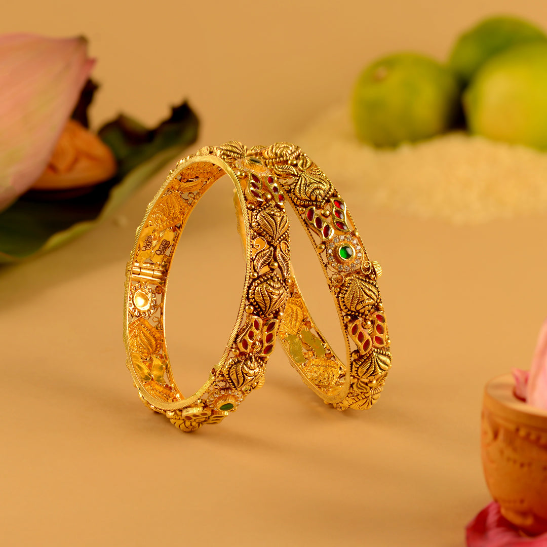 22K Gold Nakshi Bridal Bangles with Ruby–Emerald Pota & CZs