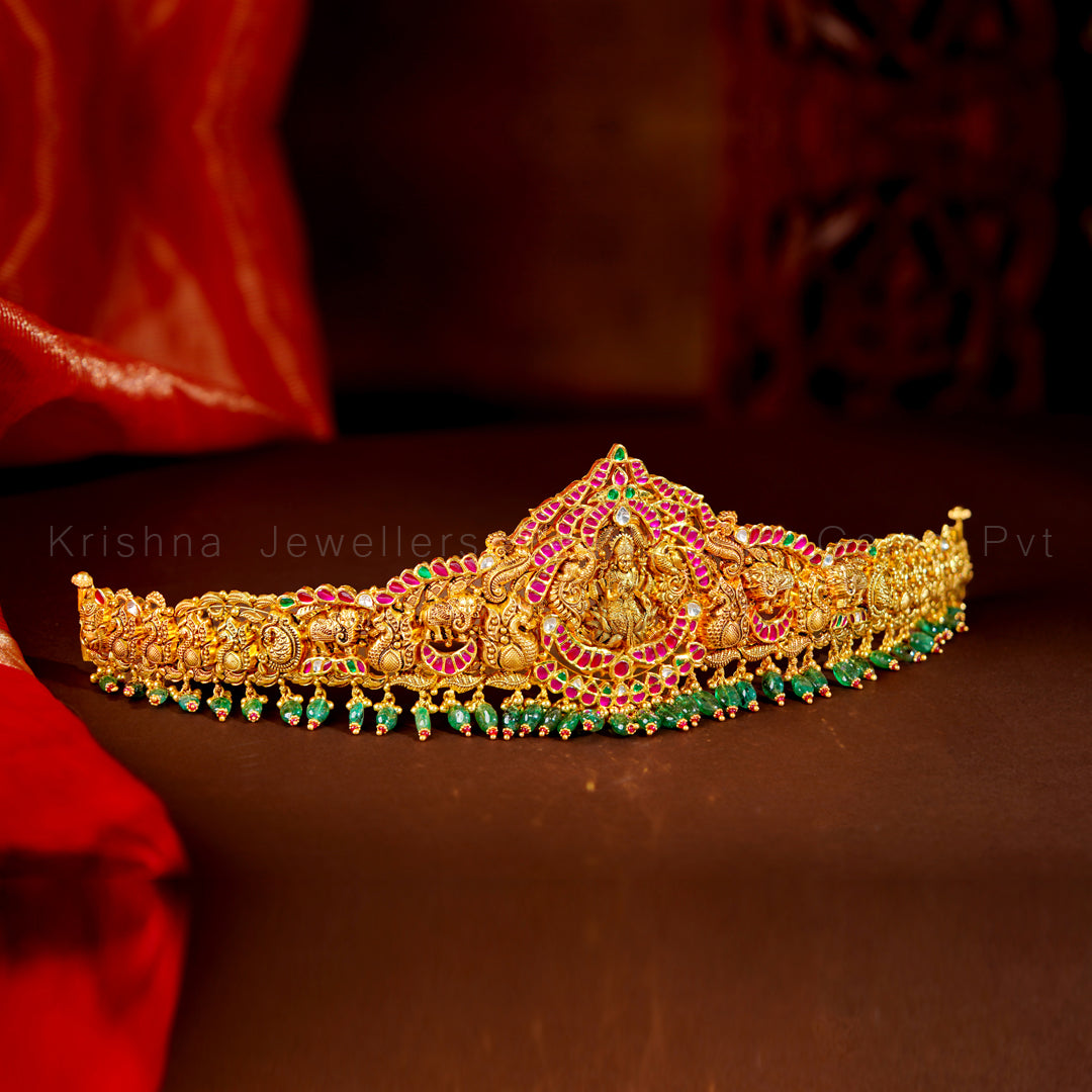 Antique Gold Kempu Vaddanam with Lakshmi Motif and Emerald Drops