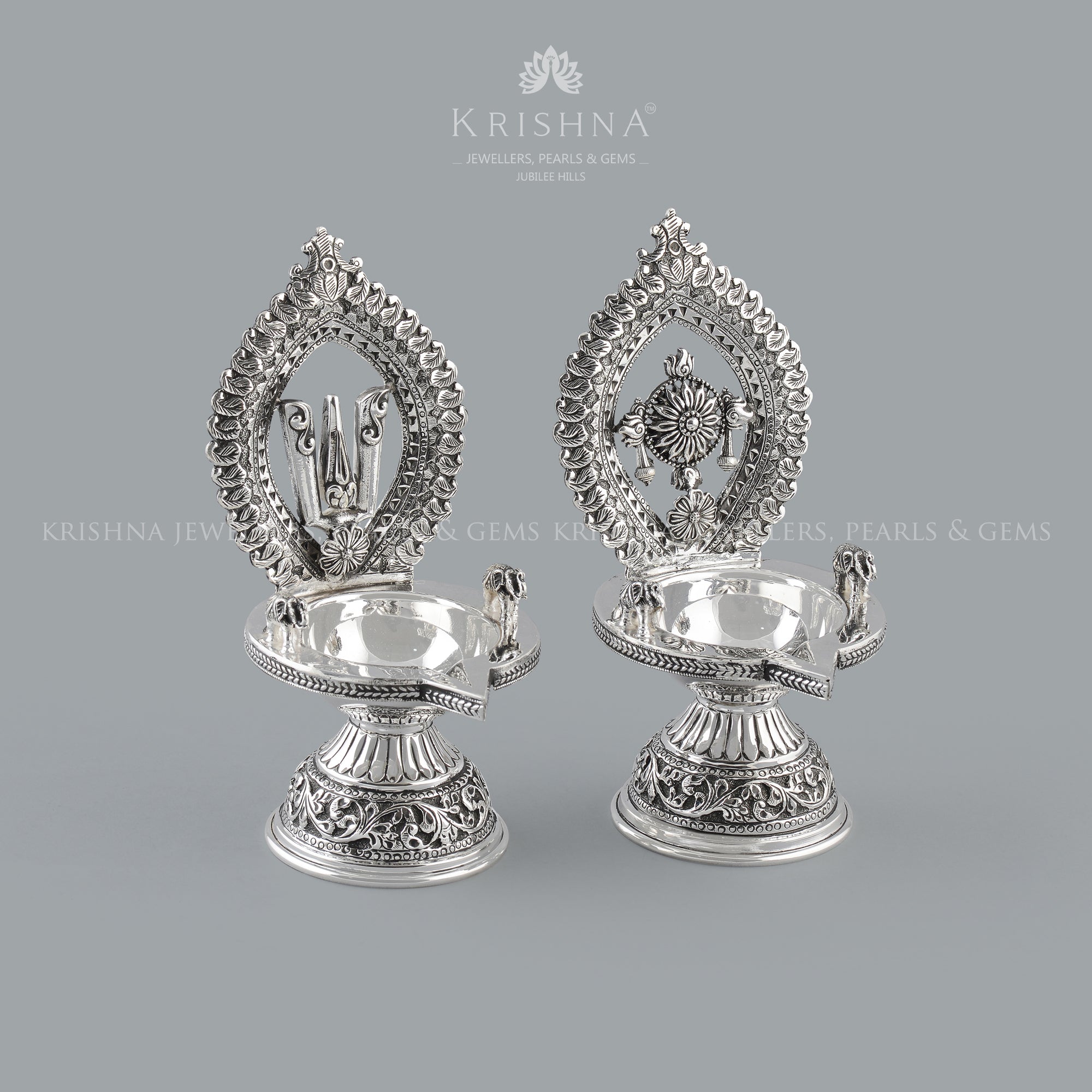 Silver Diya in Shanka Chakra Motif - Krishna Jewellers Pearls and Gems