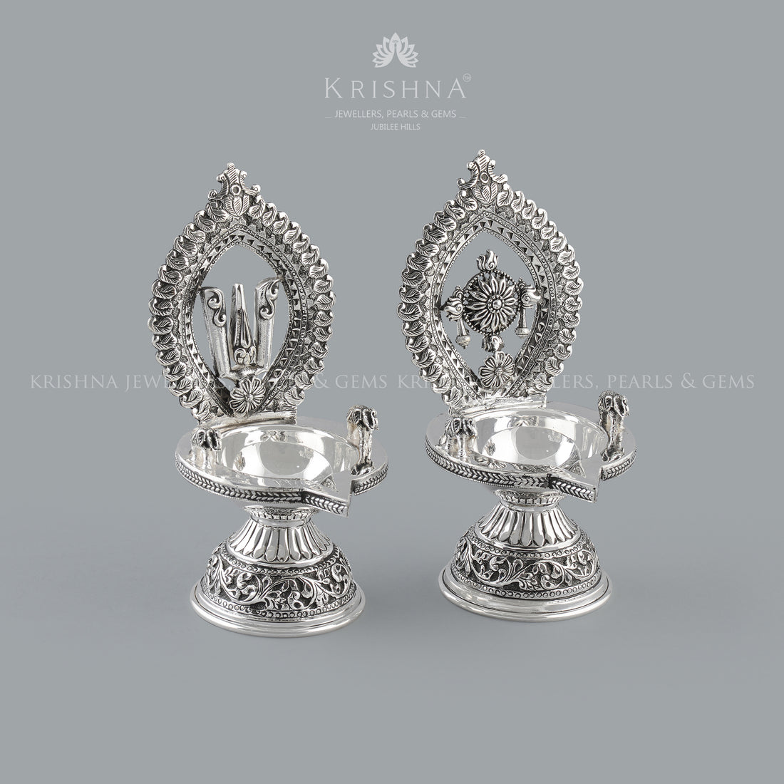 Silver Diya in Shanka Chakra Motif - Krishna Jewellers Pearls and Gems