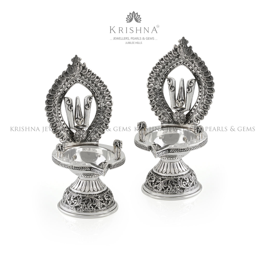 Silver Diya in Shanka Chakra Motif - Krishna Jewellers Pearls and Gems