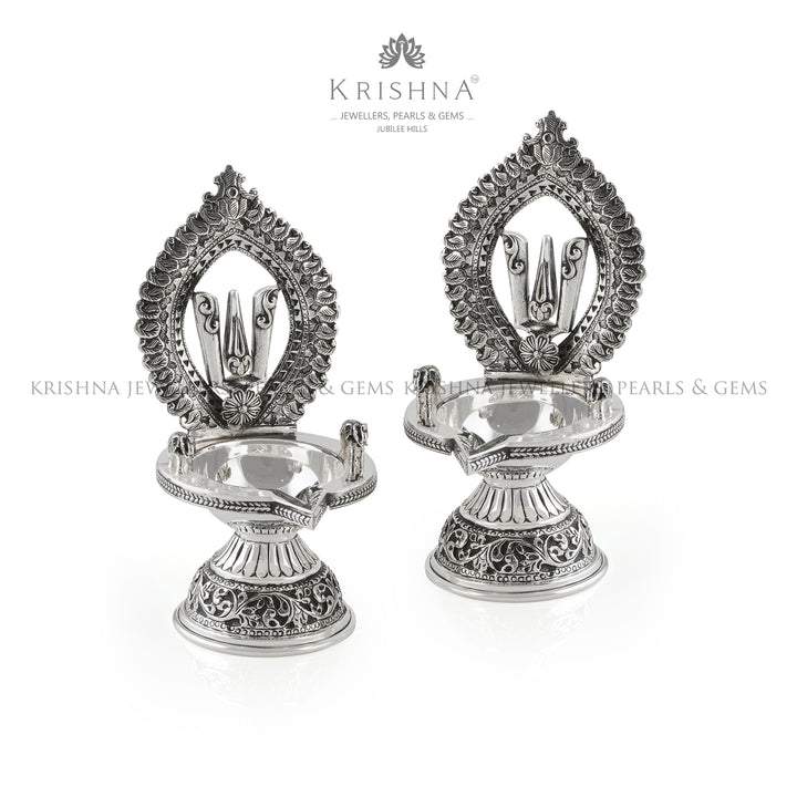 Silver Diya in Shanka Chakra Motif - Krishna Jewellers Pearls and Gems