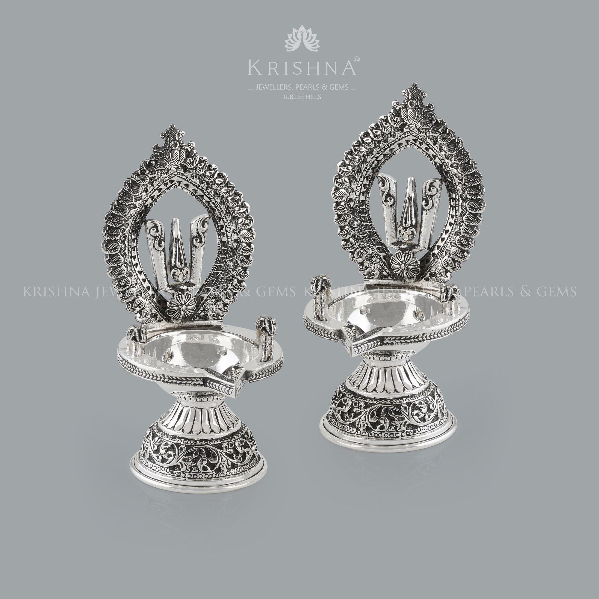 Silver Diya in Shanka Chakra Motif - Krishna Jewellers Pearls and Gems