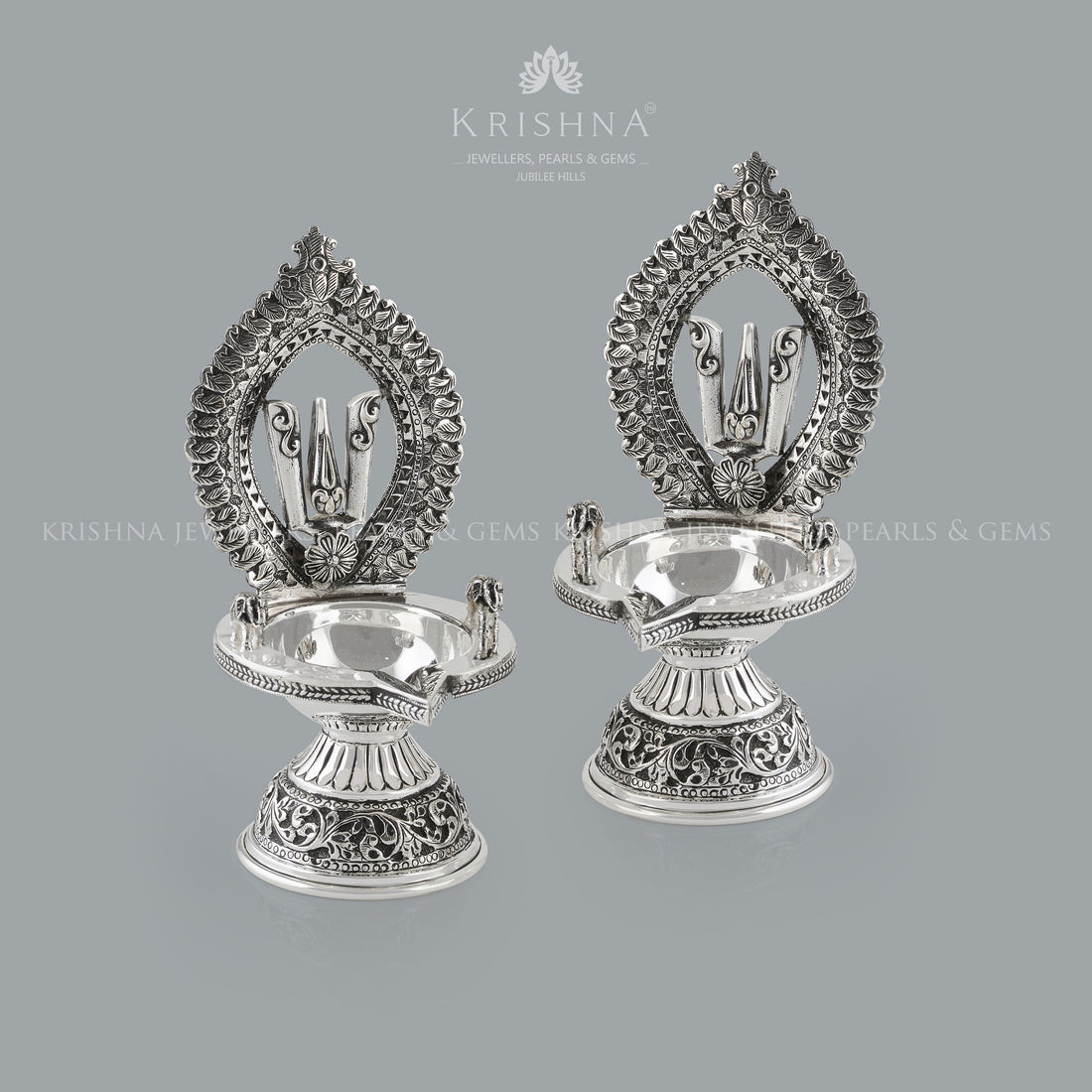 Silver Diya in Shanka Chakra Motif - Krishna Jewellers Pearls and Gems