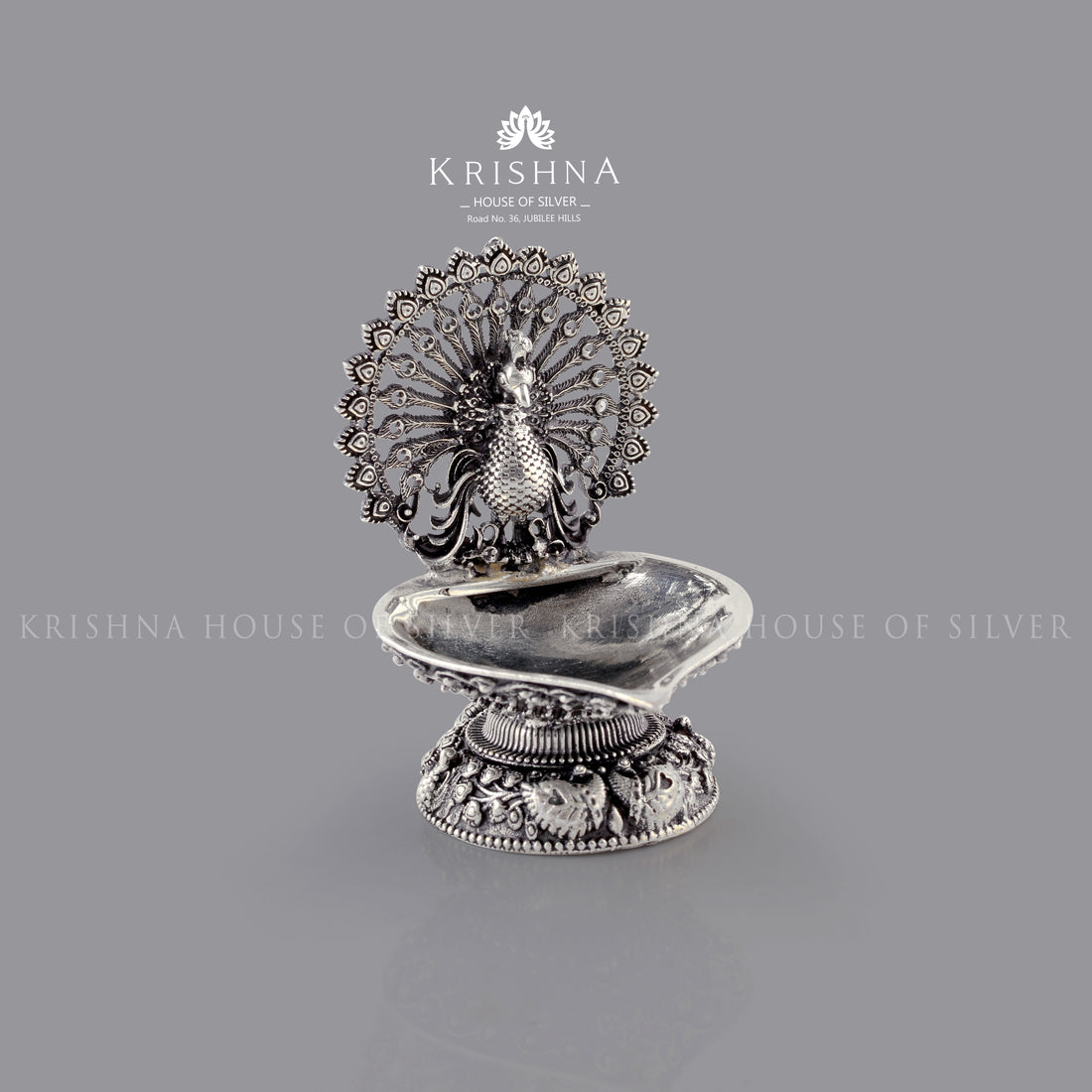Divine Peacock Deepam in Silver - Krishna Jewellers Pearls and Gems