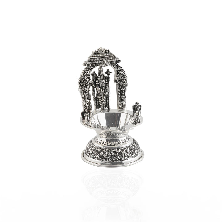 Divine glow from silver lord venkateshwara diya