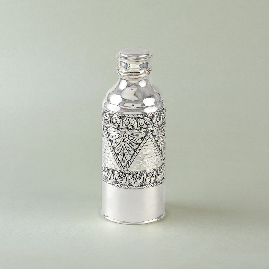 Luxurious Silver Bottle with Floral Design - Krishna Jewellers Pearls and Gems