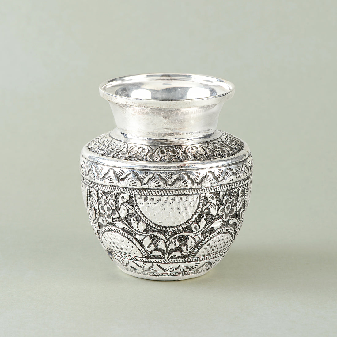 Silver Nakshi kalasha Artful pooja decor.