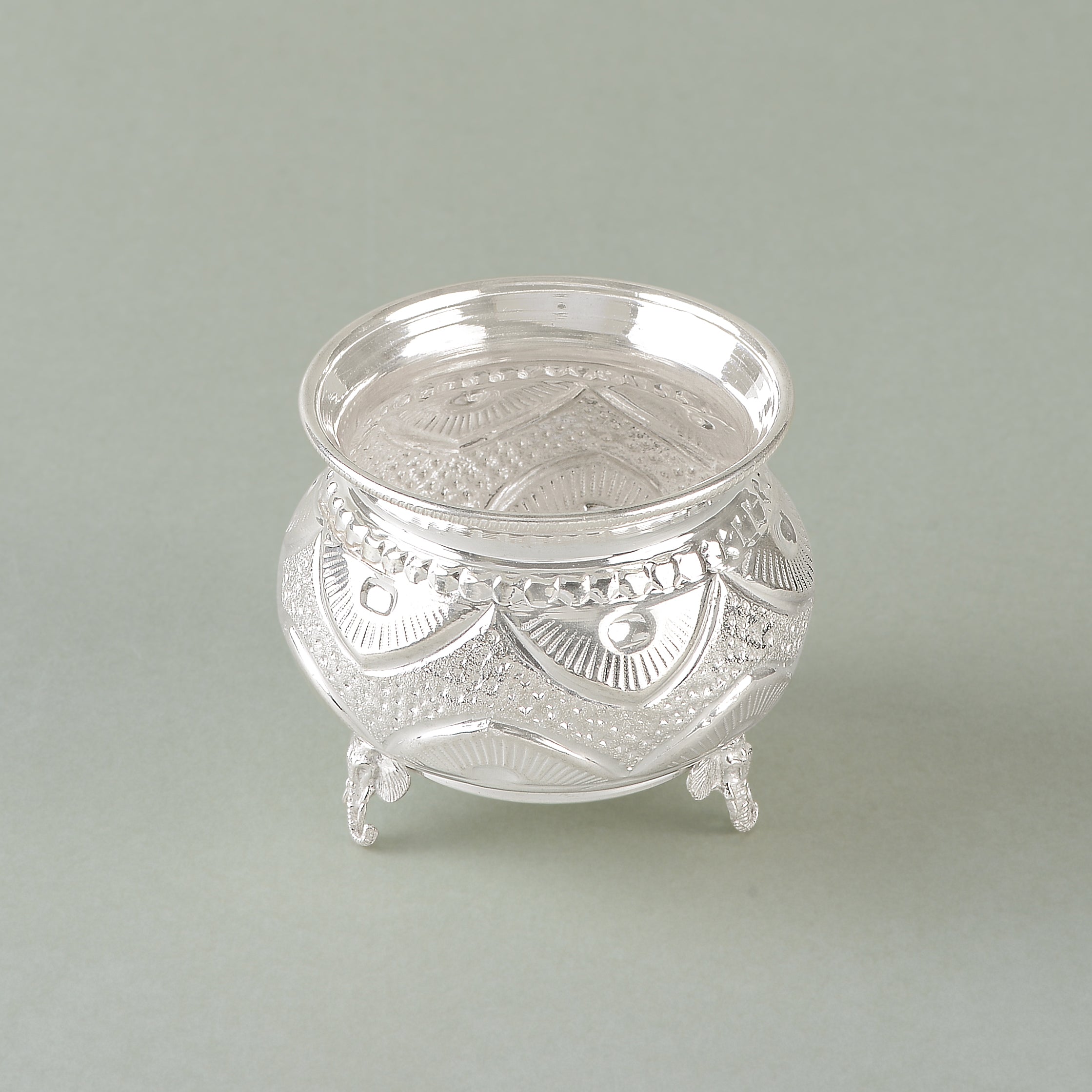 Silver Bowl with Round Thoranam Design and Three Elephant Legs