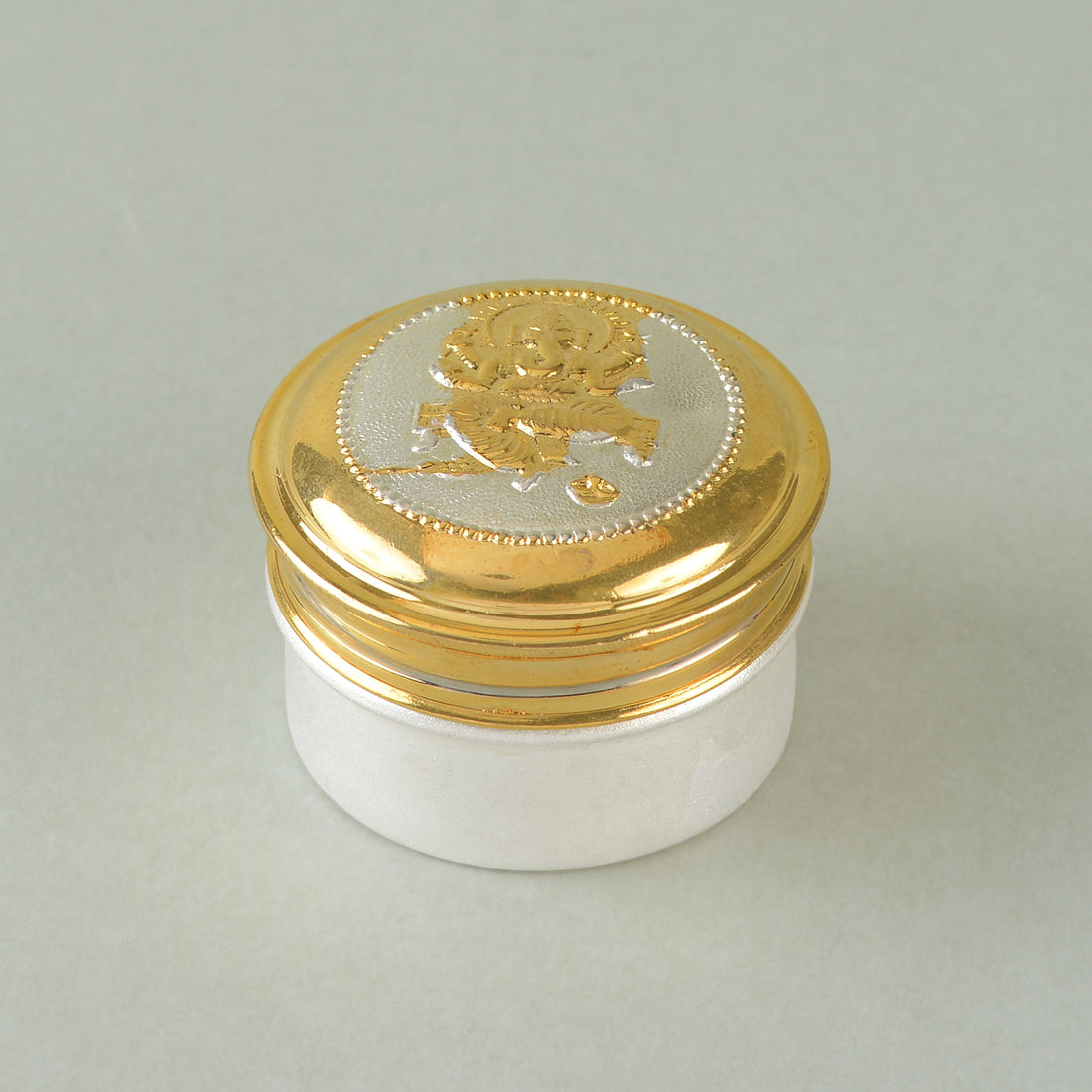 Silver Ganesh-Themed Kumkum Box with Gold Finish