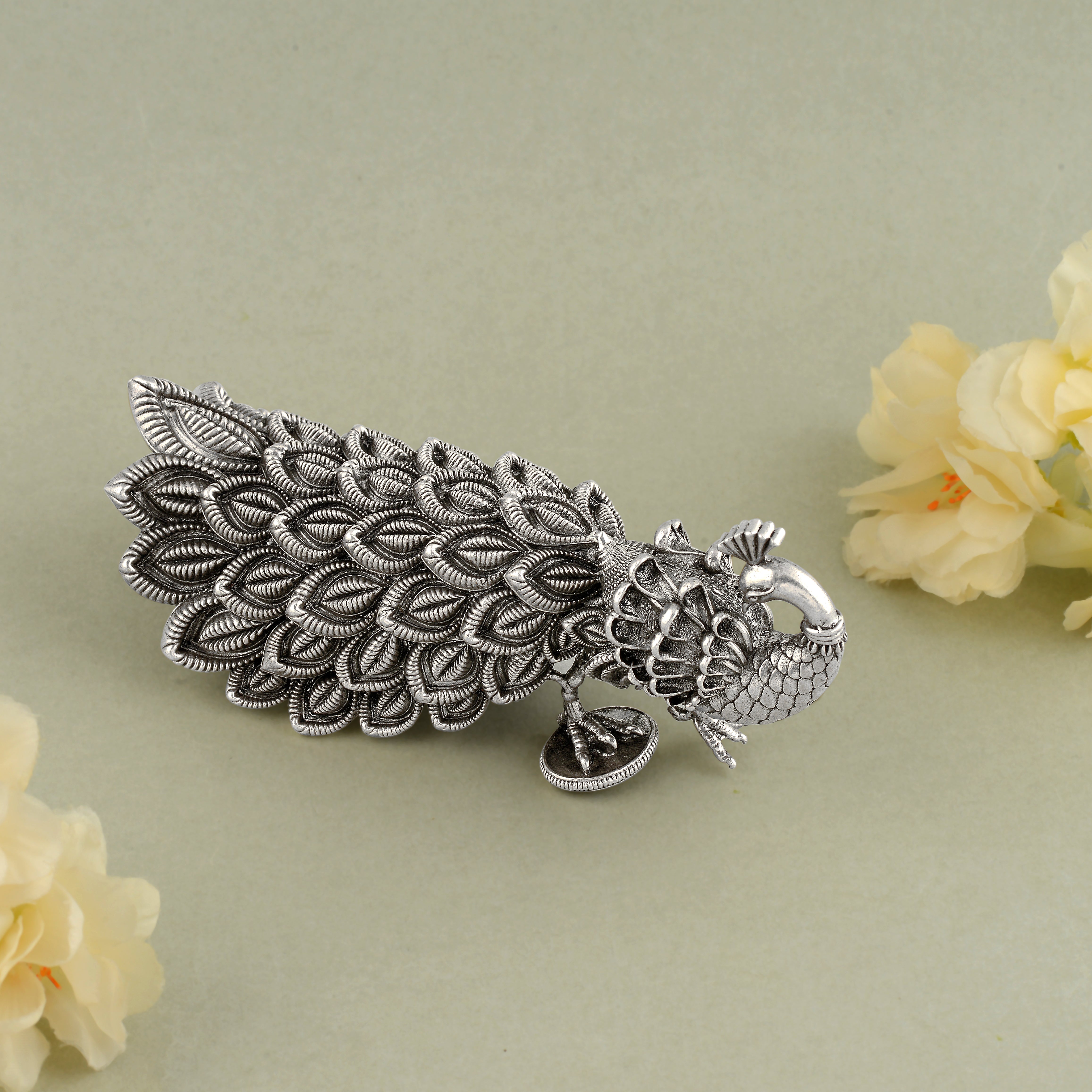 Silver Peacock Idol - Graceful & Elegant Design