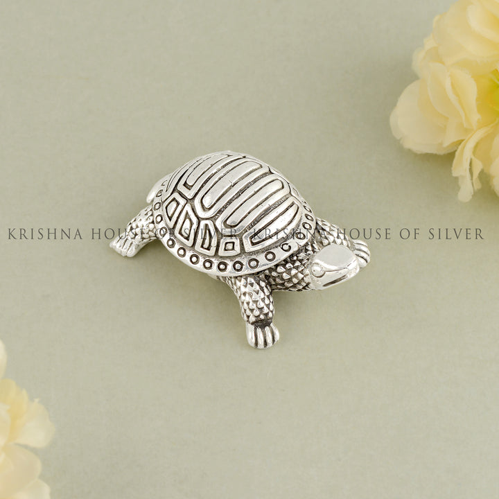 Invite good luck with the silver Tortoise.