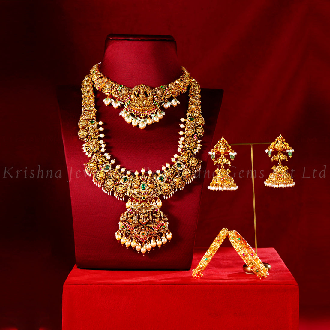 Traditional 22K Gold Bridal Set with Peacock and Lakshmi Motifs