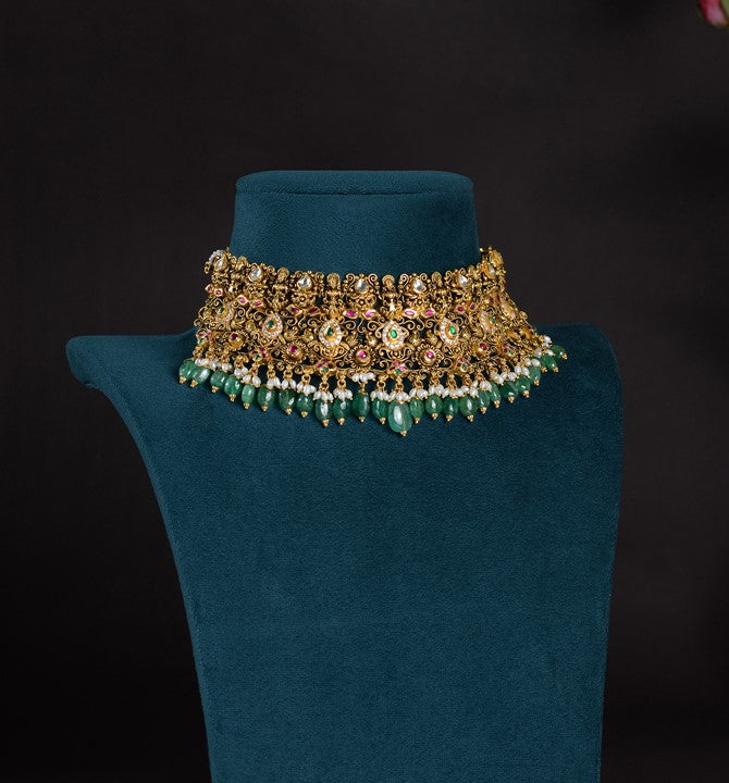 Lakshmi Devi gold choker designs with Emerald and Guttapusalu