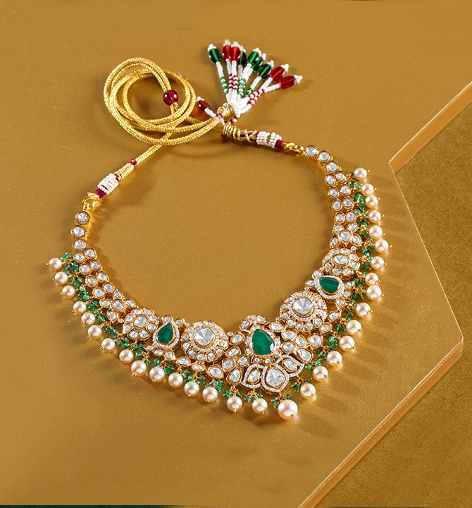Polkis Emeralds necklace in yellow gold