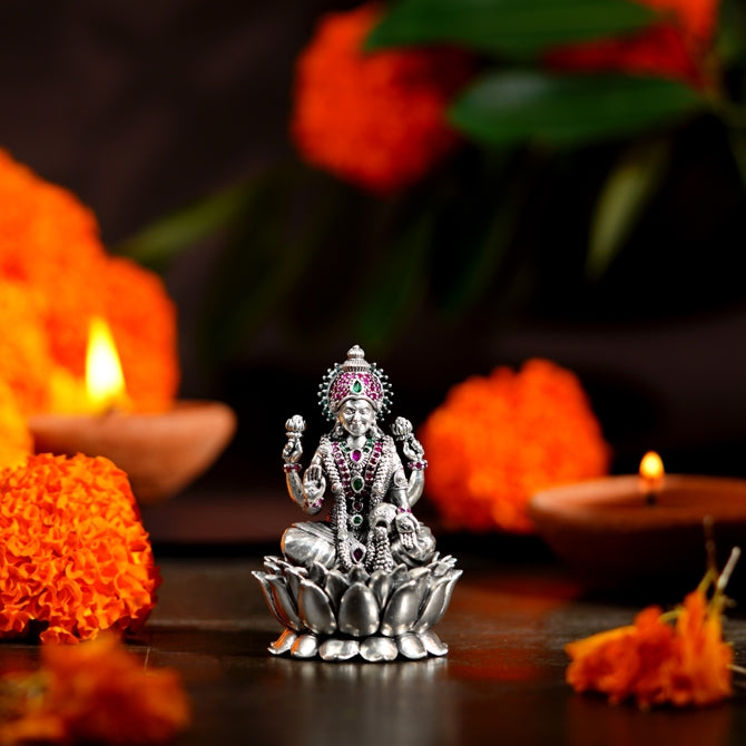 Lakshmi Devi Idol adnored with color stones