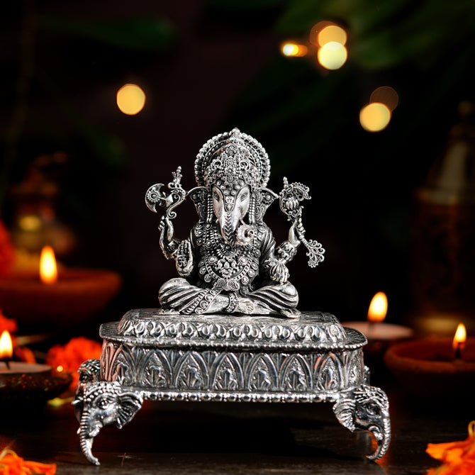 Ganesh Idol on Pedestal with Leaf Design