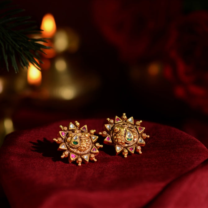 Gold Earrings with Peacock Motif and Emerald Accents