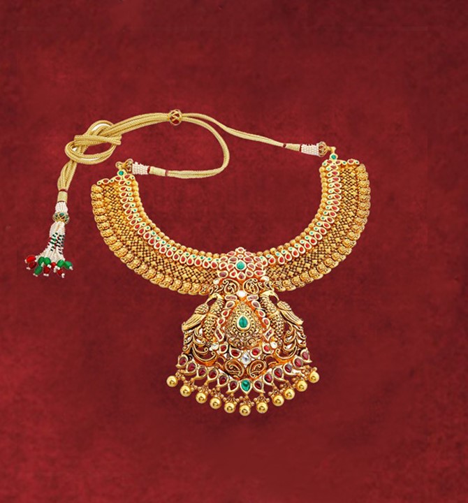 Gold Necklace with Peacock Pendant