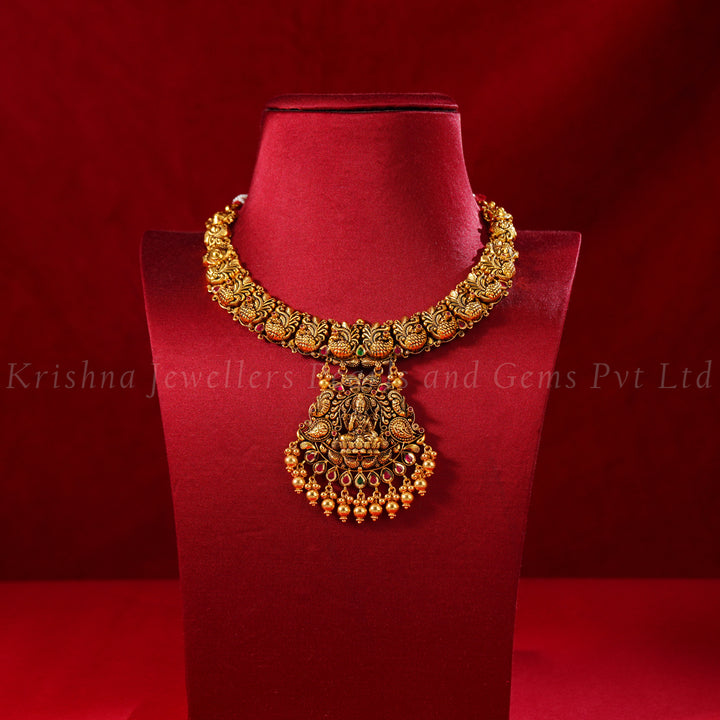 22K Gold Nakshi Peacock Necklace with Lakshmi Pendant