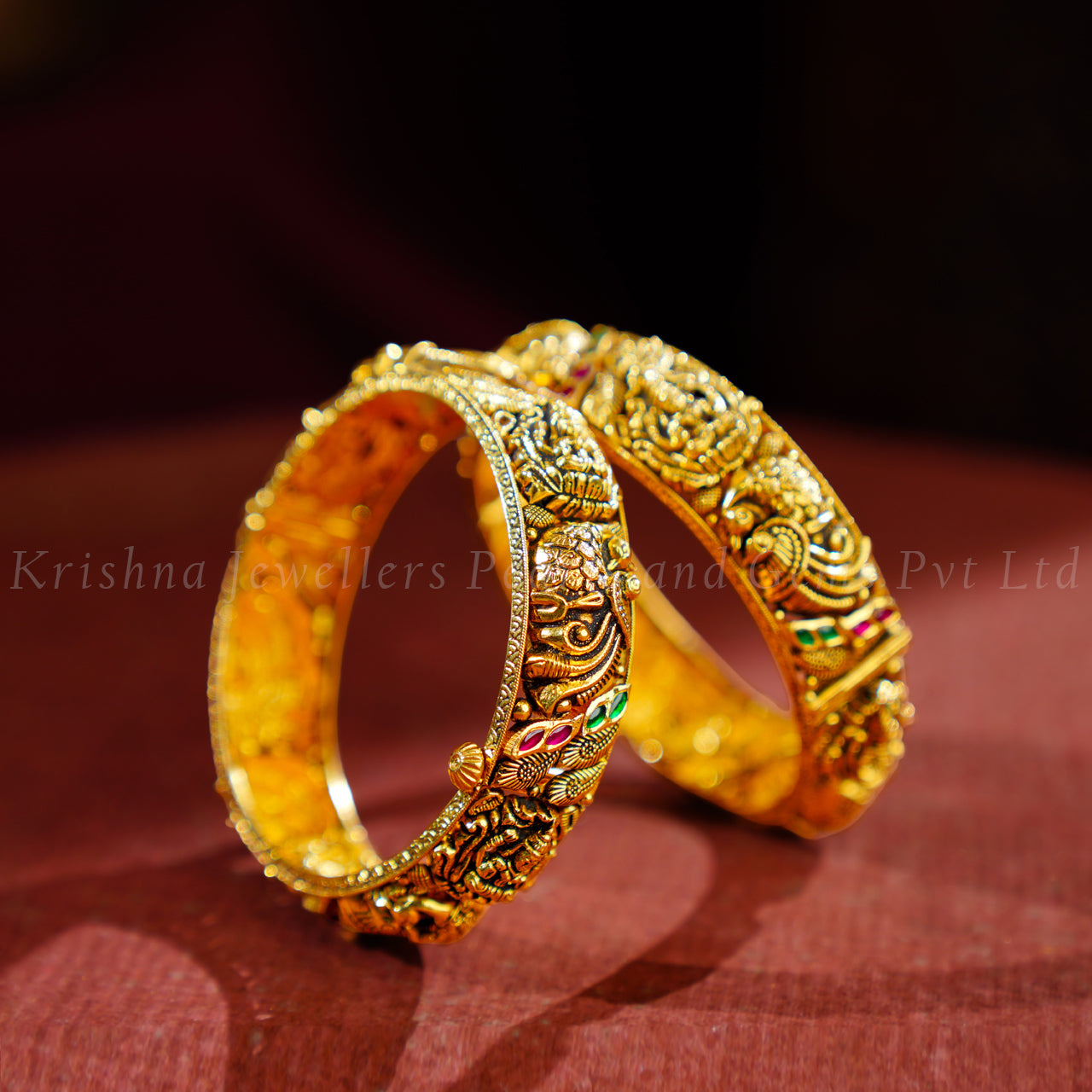 Bridal Gold Bangles with Lakshmi Devi and Peacock Design
