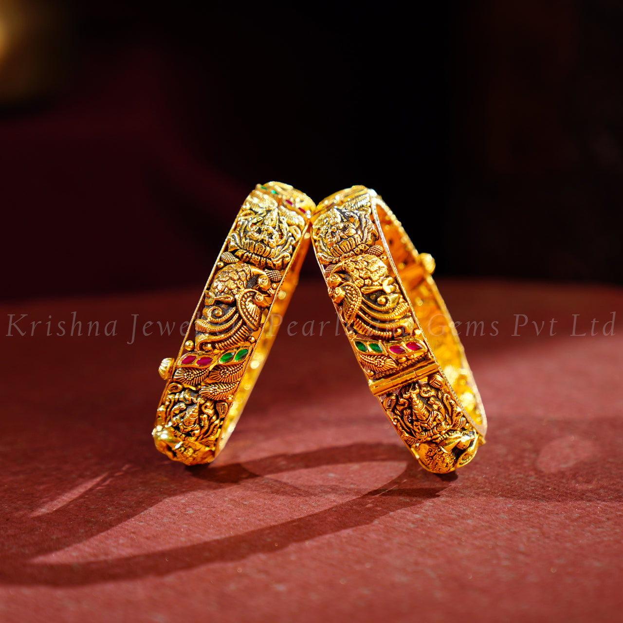Bridal Gold Bangles with Lakshmi Devi and Peacock Design