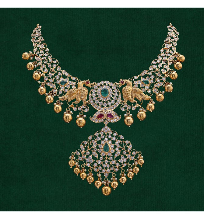 Diamond studded gold twin peacock necklace