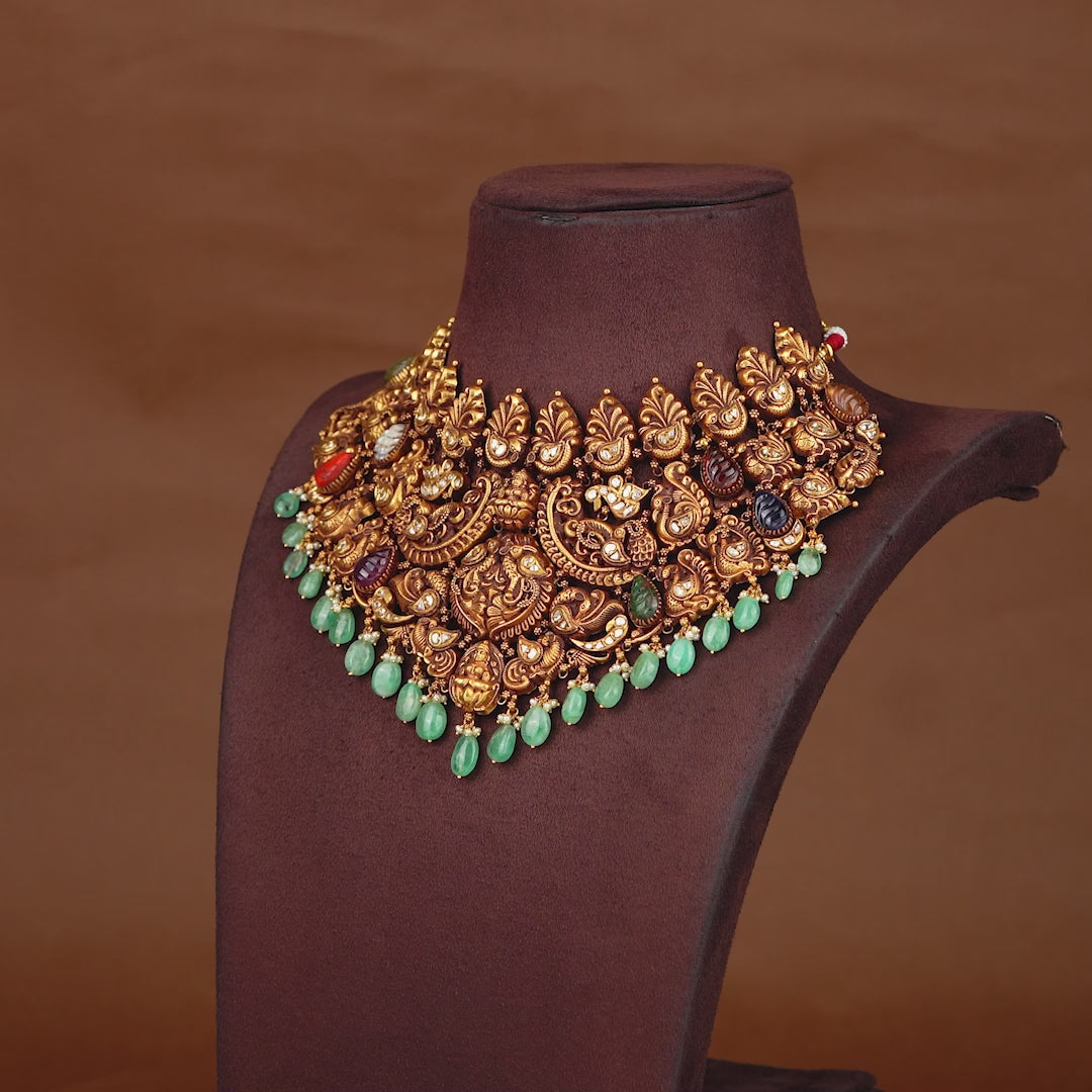 Gold Nakshi Choker With Navaratna Stones