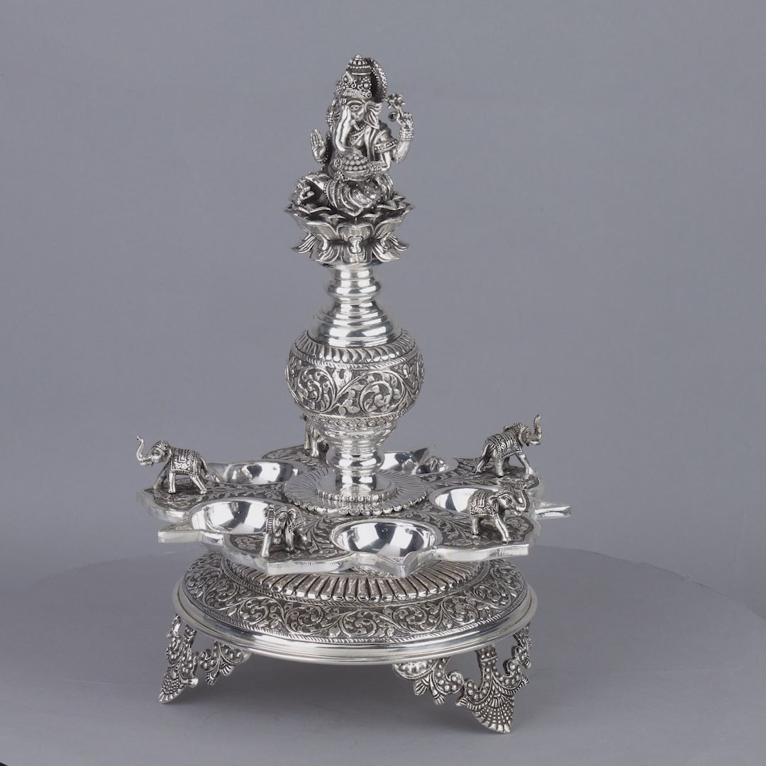 Divine Silver Diya Stand With Ganesh and Elephants