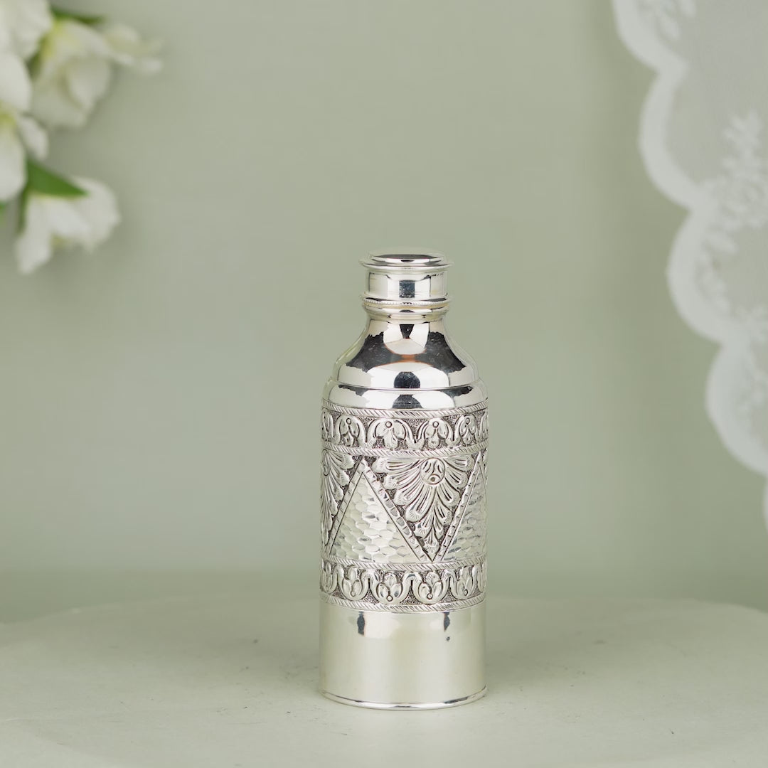 Luxurious Silver Bottle with Floral Design