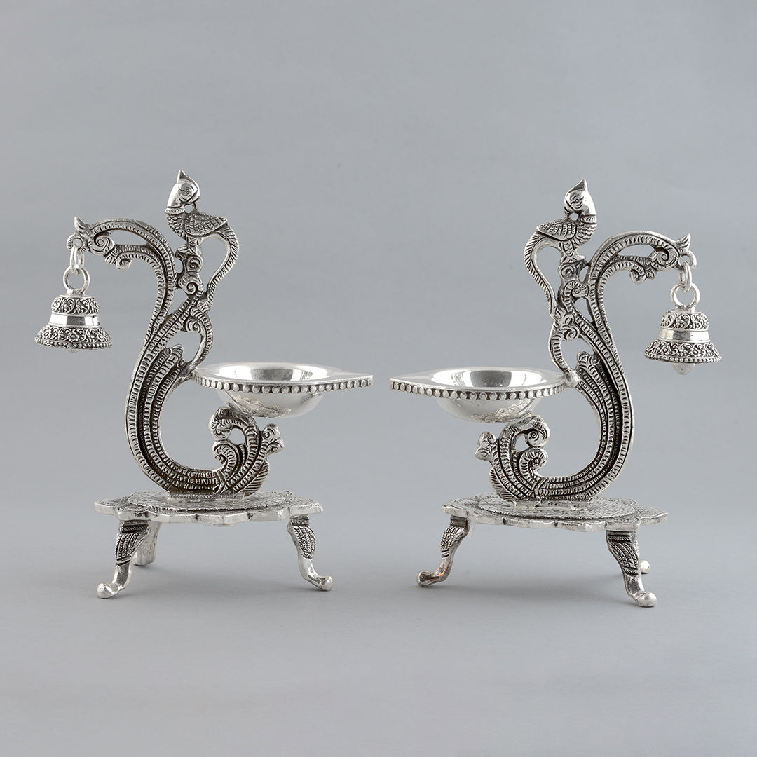Silver Peacock Deepam Stand with Hanging Bell - Krishna Jewellers Pearls and Gems